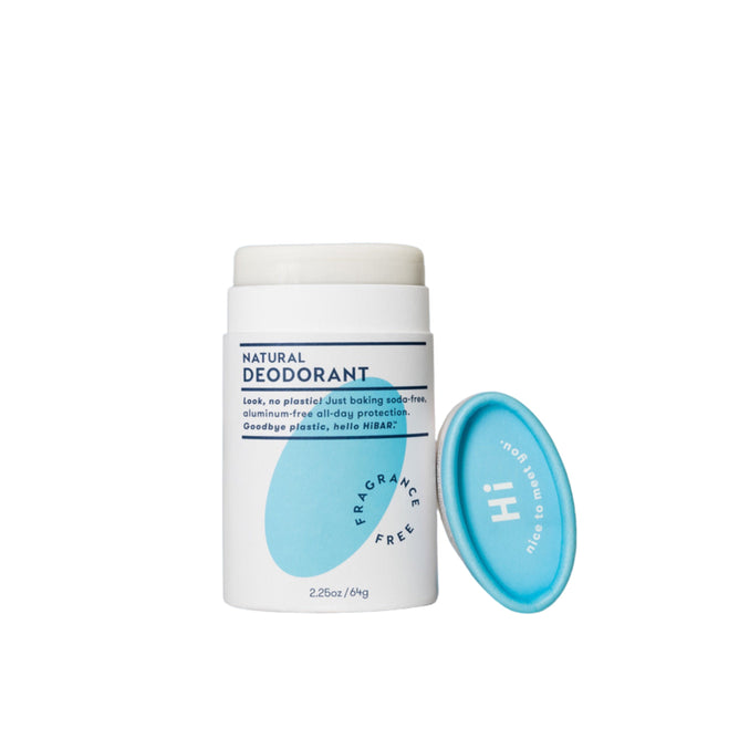 An all-natural Fragrance Free deodorant for sensitive skin by HiBAR, in a white container with blue accents and lid beside it, highlights its baking soda-free and aluminum-free formula.
