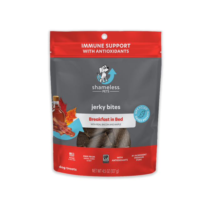 Shameless Pets Breakfast in Bed jerky bites are made with real bacon, pork, and maple, offering immune support with antioxidants. They are UPC certified and weigh 4.5 oz (127 g).