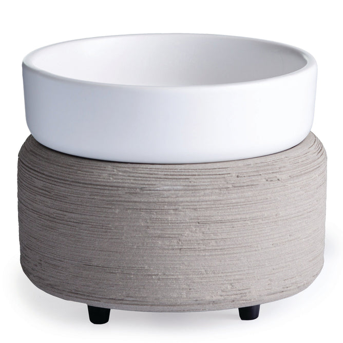 The 2-in-1 Classic Warmer by Candle Warmers Etc. features a round, white ceramic bowl on a textured gray concrete base with three black feet, blending minimalist design and functionality. Perfect for jar candles, it serves as both decor and a practical accessory.