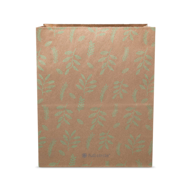 The Scrap Sacks by Full Circle is an eco-friendly brown paper bag with green leaf patterns, a flat base for stability, and the full circle logo near the bottom. Its designed for composting scraps, standing upright against a plain backdrop.
