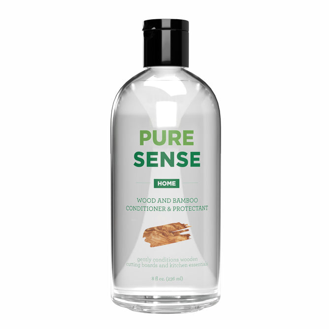 The 8 fl oz (236 ml) clear bottle of Pure Sense Wood & Bamboo Cutting Board Conditioner and Protectant features green text and a wooden pieces image. It gently nourishes cutting boards and kitchen essentials with a food-grade mineral oil formula for optimal care.