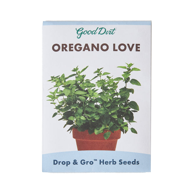 The Seed Pack - Oregano Love by Good Dirt features herb seeds in a terracotta pot. Labeled Drop & Gro Herb Seeds, these Certified Non-GMO seed pods are ideal for budding gardeners.