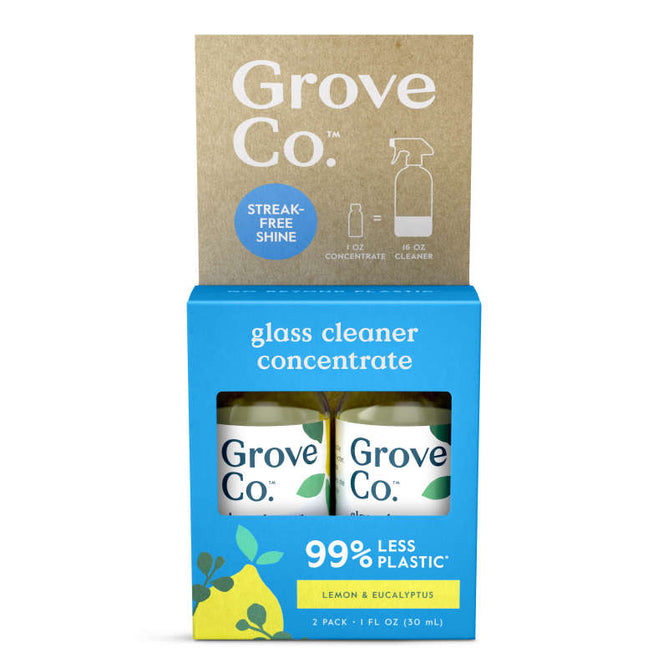 The Grove Co. Glass Cleaner Concentrate, featuring a lemon eucalyptus scent, offers Streak-Free Shine and reduces plastic by 99% with its refillable system. This plant-based formula comes in blue and cardboard packaging with two bottles.